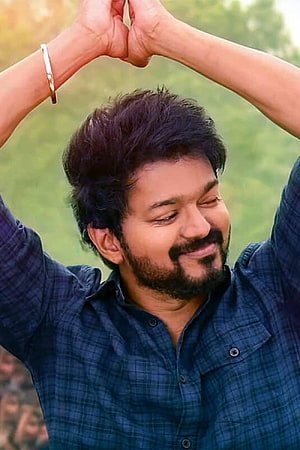 Thalapathy Vijay Making a Heart Shape with Hands in a Blue Plaid Shirt HD phone wallpaper
