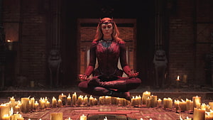 Scarlet Witch Wanda Maximoff Meditating in Candlelit Stone Chamber HD wallpaper