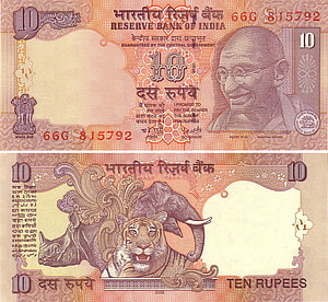 Indian Ten Rupee Banknote Featuring Mahatma Gandhi and Tiger Illustration HD wallpaper