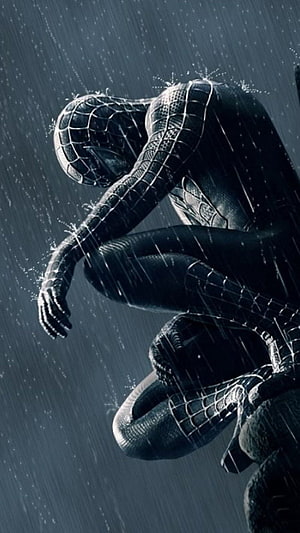 Spider-Man in Black Symbiote Suit Crouching in Heavy Rain HD phone wallpaper