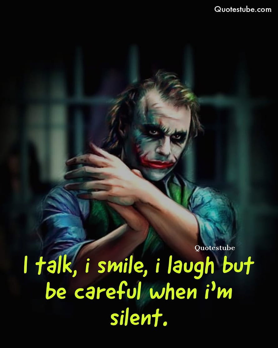 Joker Character Portrait with Dark Green Suit and White Face Paint in Moody Setting HD phone wallpaper