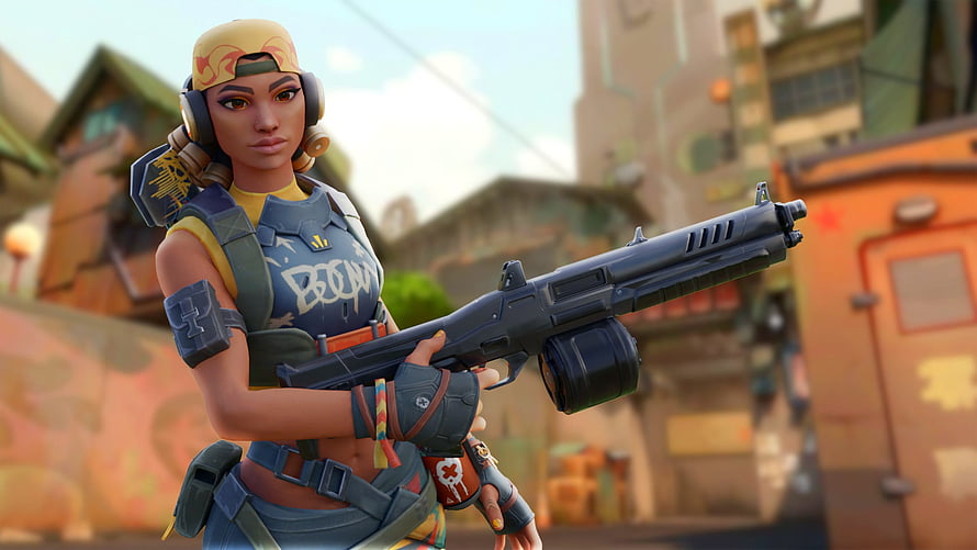 Valorant Agent Character Render Holding Drum Magazine Rifle in Stylized Urban Setting HD wallpaper