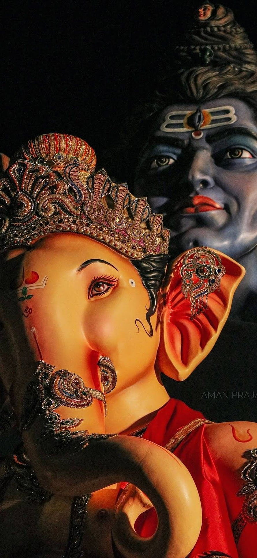 Lord Ganesha and Lord Shiva Divine Portrait with Ornate Jewelry and Sacred Symbols HD phone wallpaper