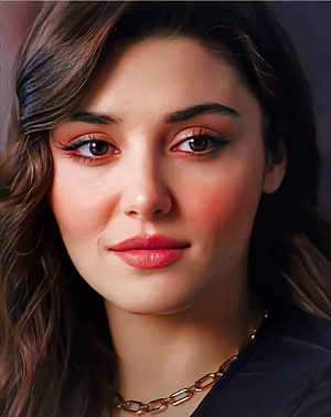 Hande Erçel Close-Up Portrait with Warm Makeup and Gold Chain Necklace HD phone wallpaper
