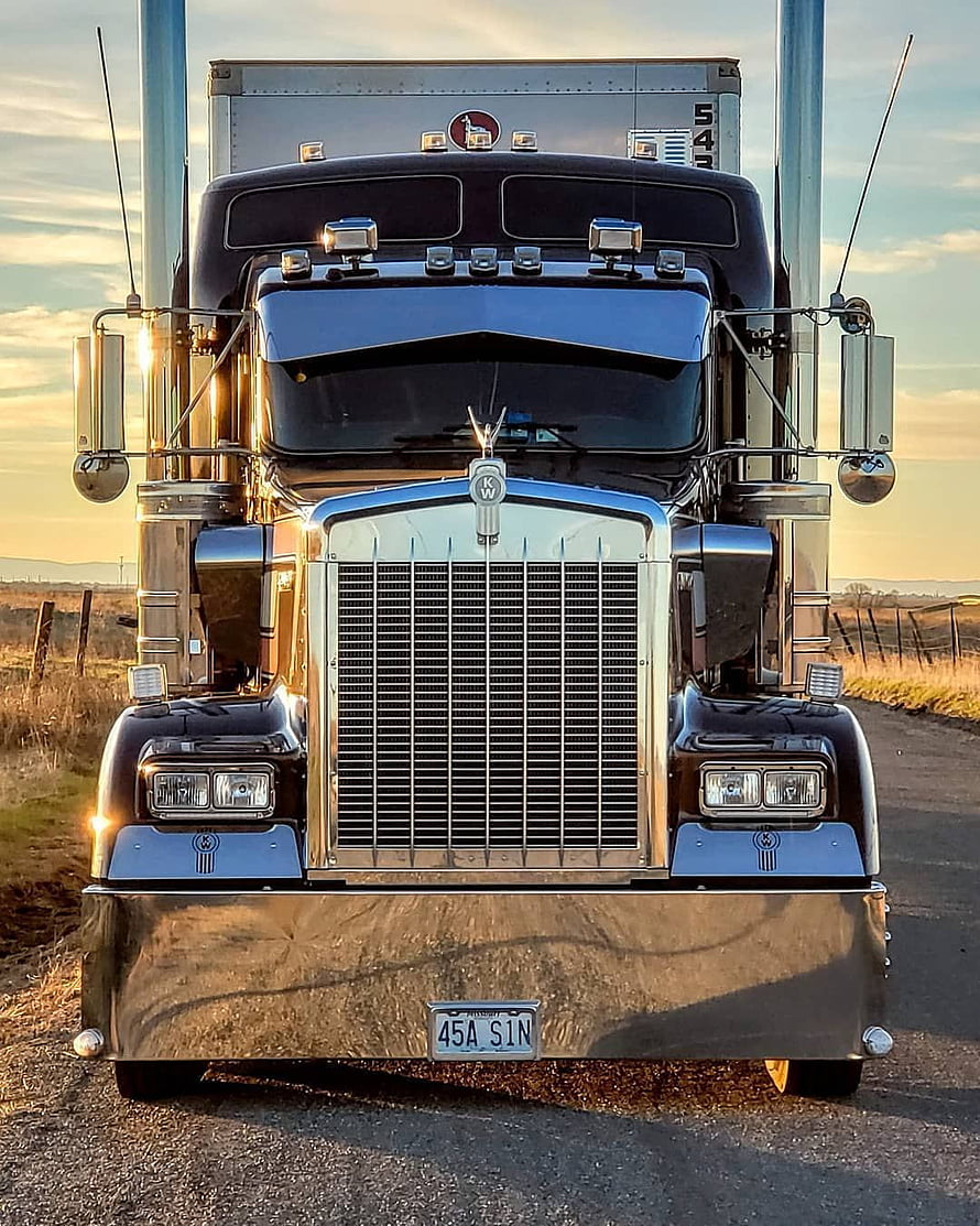 Front View of a Polished Kenworth W900 Semi Truck on a Rural Road at Sunset HD phone wallpaper