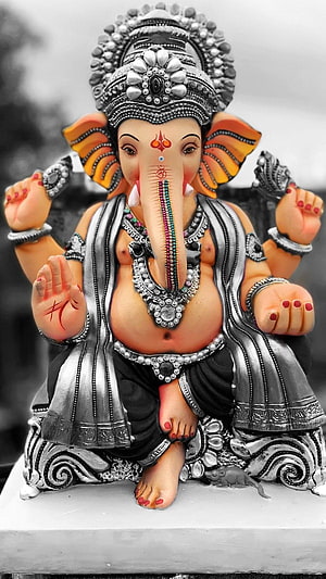 Lord Ganesha Silver Ornament Statue with Intricate Jewelry and Decorative Details HD phone wallpaper