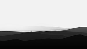 Monochrome Minimalist Mountain Silhouettes with Layered Depth and Soft Gradient Sky HD wallpaper