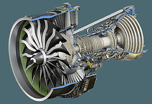 GE9X Commercial Aircraft Engine Cutaway Diagram Showing Internal Turbine and Compressor Components HD wallpaper
