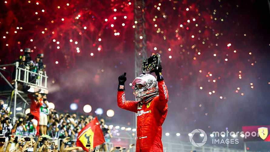 Sebastian Vettel Celebrates Victory at Singapore Grand Prix with Ferrari Fireworks HD wallpaper