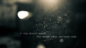 Inspirational Quote on Dark Bokeh Background with Floating Particles and Soft Light HD wallpaper