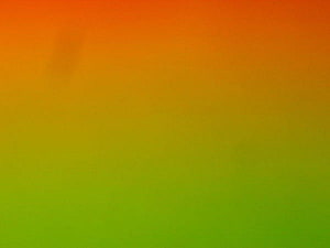 Vibrant Orange and Green Gradient Background with Smooth Color Transitions HD wallpaper