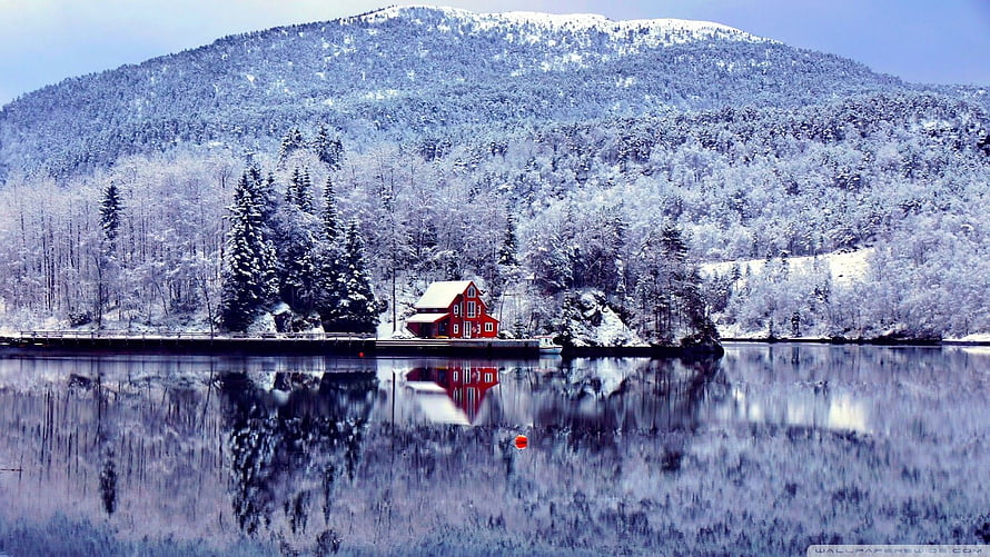 Red Lakeside Cottage in Snowy Winter Landscape with Mountain Reflection HD wallpaper