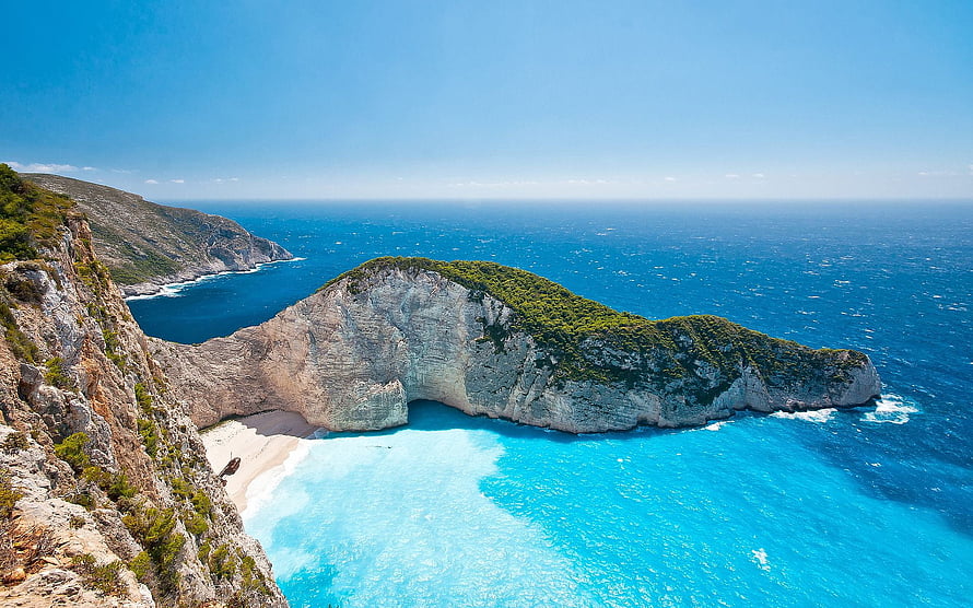 Navagio Beach Cliffs and Turquoise Waters on Zakynthos Island in Greece HD wallpaper