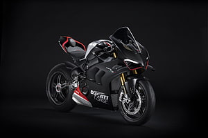 Ducati Panigale V4 SP2 Superbike in Matte Black with Red Accents on Dark Studio Background HD wallpaper