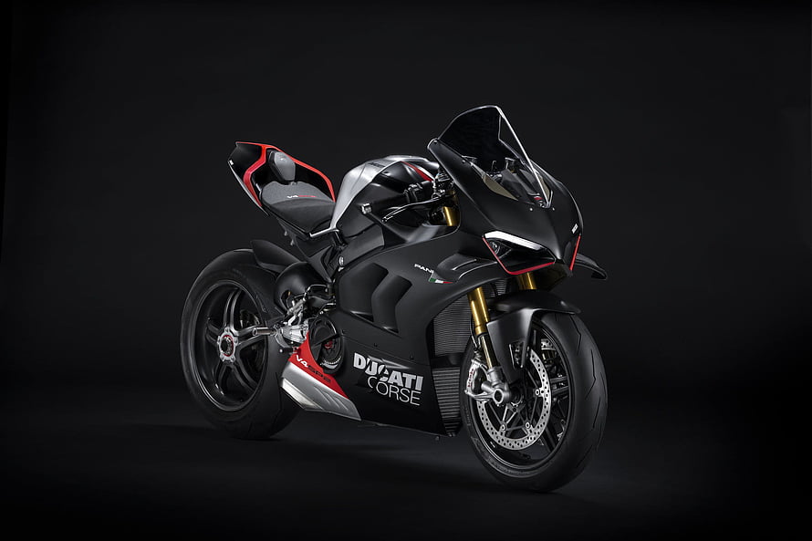 Ducati Panigale V4 SP2 Superbike in Matte Black with Red Accents on Dark Studio Background HD wallpaper