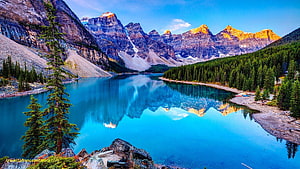 Maligne Lake Reflections of the Canadian Rockies with Turquoise Waters and Pine Forests HD wallpaper