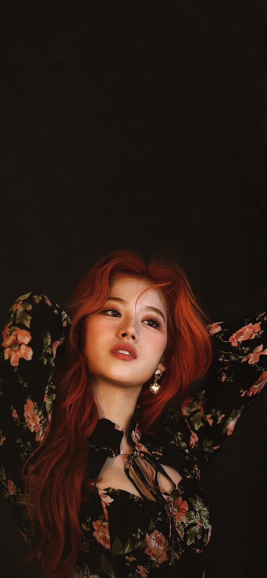 Sana from TWICE in a floral dress with vibrant red hair against a dark background HD phone wallpaper