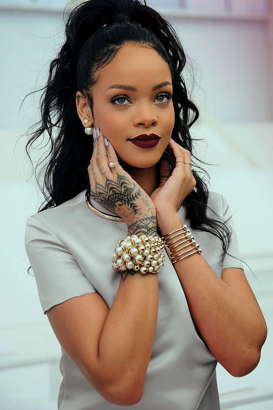 Rihanna in a light grey dress with pearl jewelry and dark red lipstick HD phone wallpaper