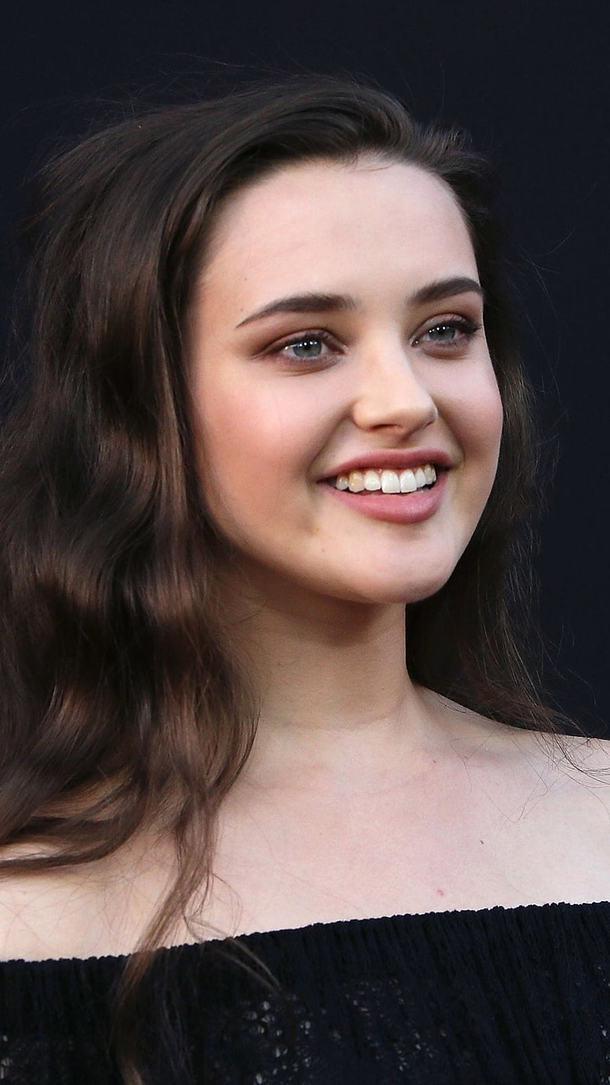 Katherine Langford Portrait with Warm Smile and Wavy Brunette Hair HD phone wallpaper