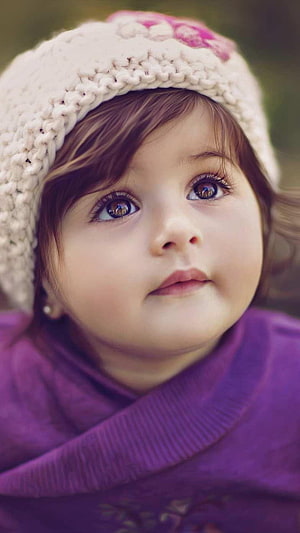 Adorable Toddler Girl Wearing a Knit Beanie and Purple Turtleneck Sweater HD phone wallpaper