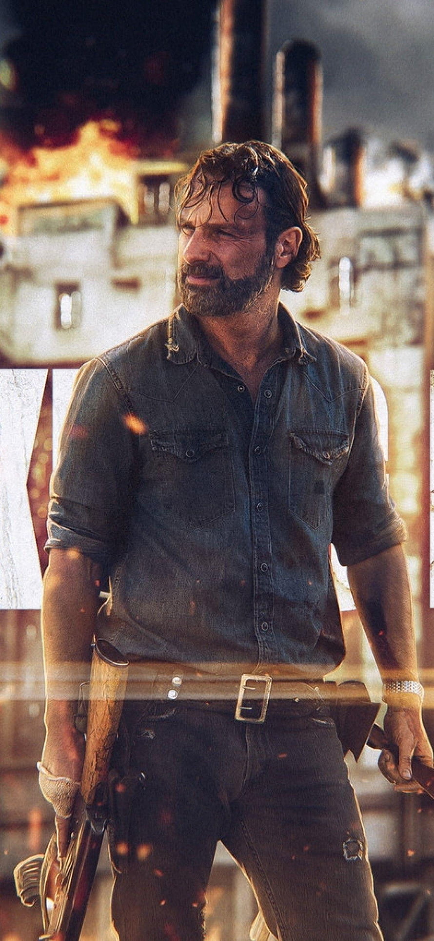 Rick Grimes in a denim shirt holding a rifle against a fiery industrial backdrop HD phone wallpaper
