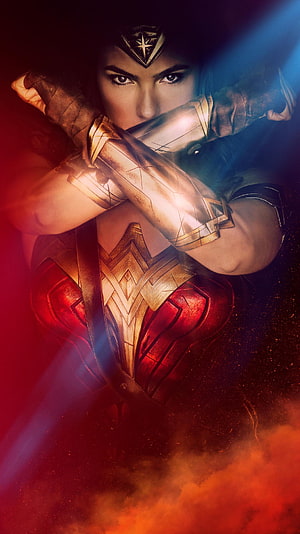 Wonder Woman in Golden Armor with Crossed Arms and Dramatic Red and Blue Lighting HD phone wallpaper