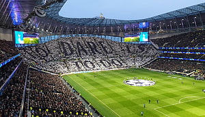 Tottenham Hotspur Stadium Interior With Massive Tifo Display And Full Crowd HD wallpaper