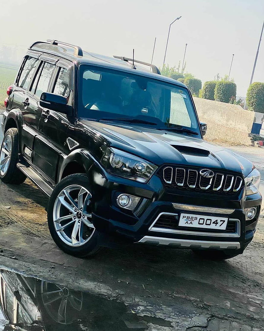Black Mahindra Scorpio S11 Modified SUV with Custom Alloy Wheels and Front Bumper HD phone wallpaper