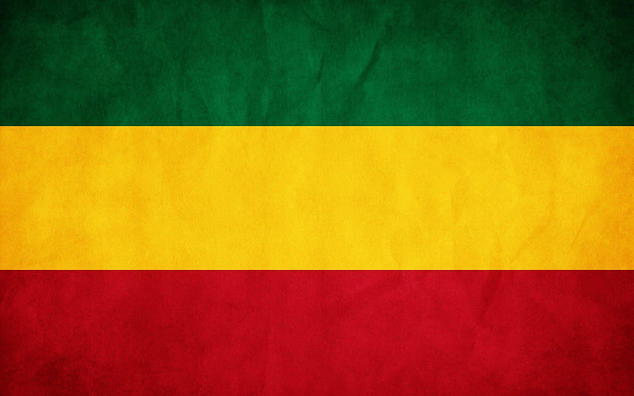Jamaica National Flag With Green Yellow And Red Horizontal Stripes On Textured Paper Background HD wallpaper