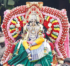 Angalamman Deity Adorned in Flowers and Jewels at Melmalayanur Temple Festival HD wallpaper