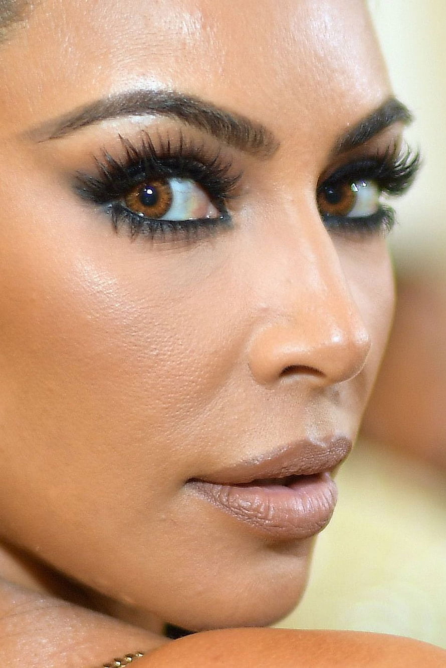 Kim Kardashian Close-Up Portrait With Dramatic Eye Makeup and Glossy Lips HD phone wallpaper