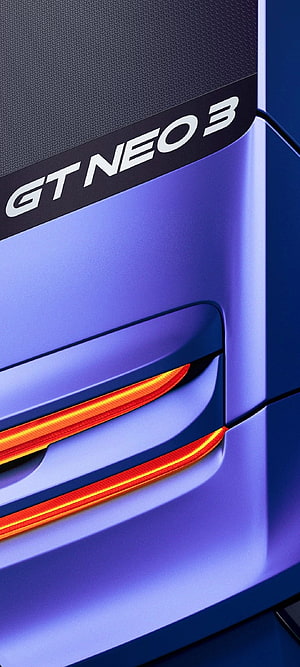 Realme GT Neo 3 Smartphone Close-Up with Glowing Orange Accents and Purple Finish HD phone wallpaper