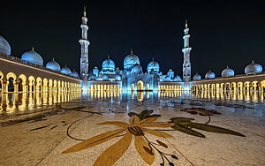 Sheikh Zayed Grand Mosque at Night with Reflective Courtyard and Floral Mosaic HD wallpaper