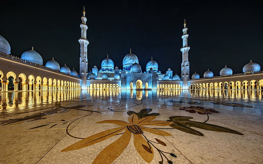Sheikh Zayed Grand Mosque at Night with Reflective Courtyard and Floral Mosaic HD wallpaper