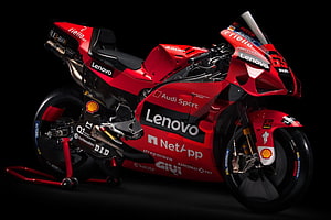 Ducati Lenovo Team MotoGP Racing Motorcycle with Red Sponsor Livery HD wallpaper