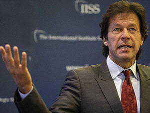 Imran Khan Gesturing During a Formal Public Address at a Conference HD wallpaper