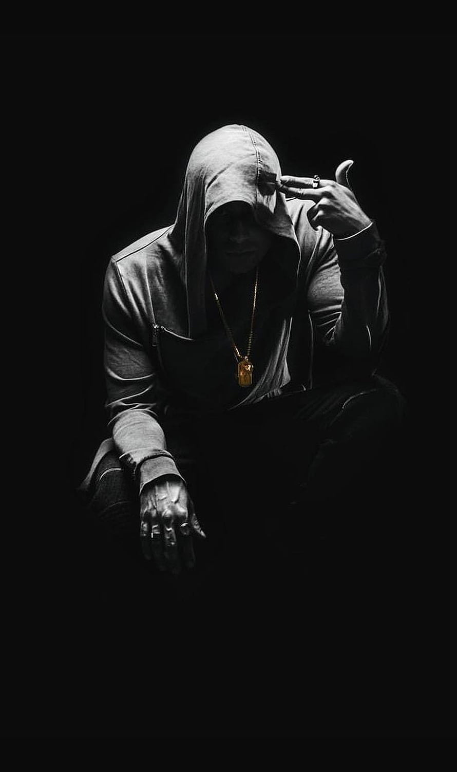 Moody Man in Hoodie Smoking Cigarette Against Black Background HD phone wallpaper