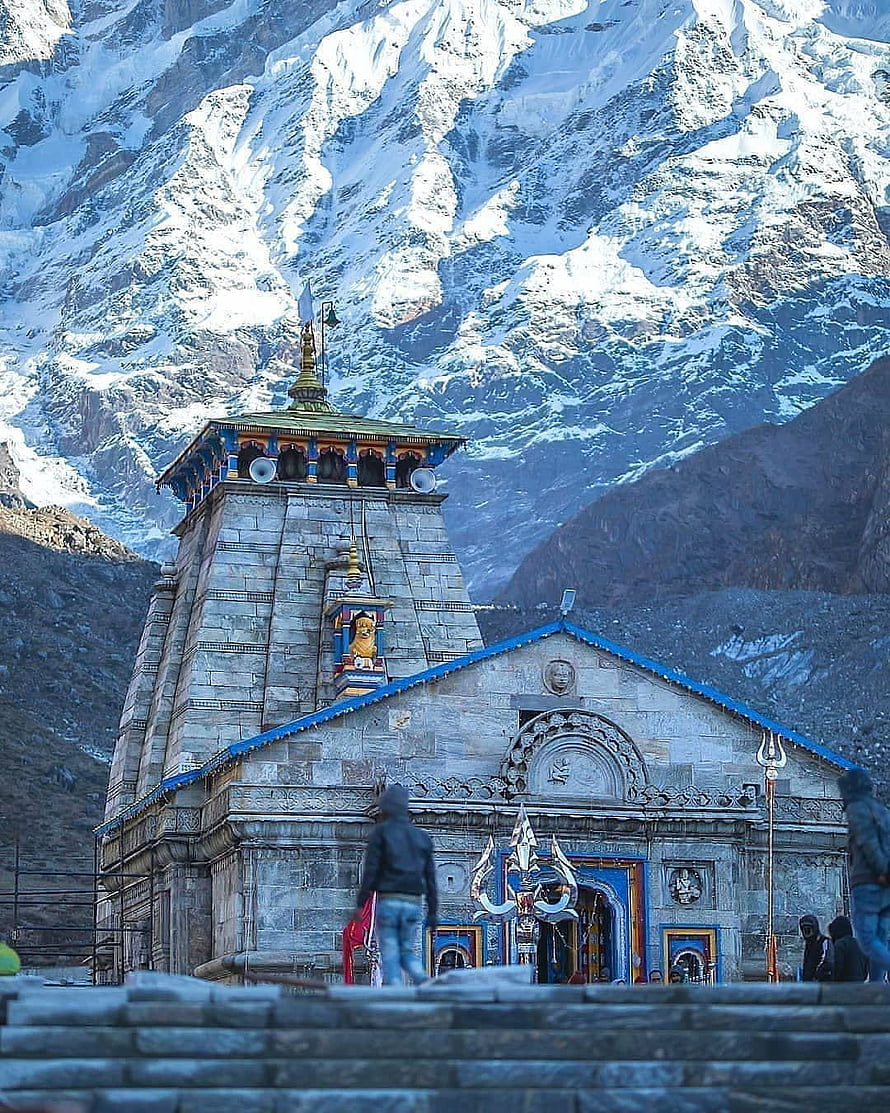 Kedarnath Temple in the Himalayas with Snow-Capped Peaks and Stone Architecture HD phone wallpaper