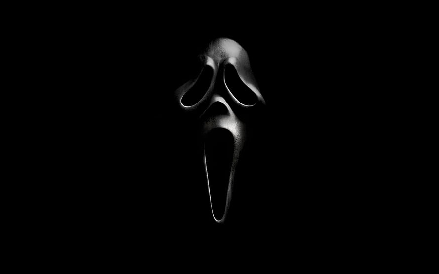 Ghostface Scream Mask in Dramatic Black and White Horror Portrait HD wallpaper