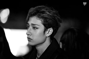Bang Chan from Stray Kids in a moody black and white profile portrait with dark aesthetic styling HD wallpaper