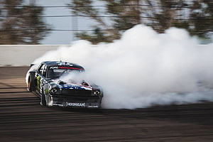 Ken Block Hoonicorn Mustang V2 Drifting on Track with Thick Tire Smoke HD wallpaper