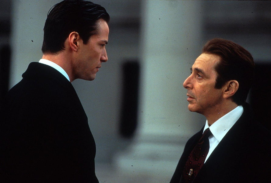 The Devil's Advocate Film Scene Featuring Two Men in Suits in a Tense Confrontation HD wallpaper