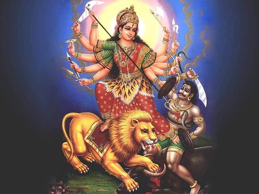 Kali Amman Riding Lion with Multiple Arms Holding Weapons and Demon Subjugation HD wallpaper