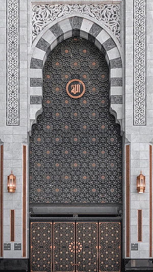 Ornate Islamic Archway with Intricate Geometric Metalwork and Calligraphy HD phone wallpaper