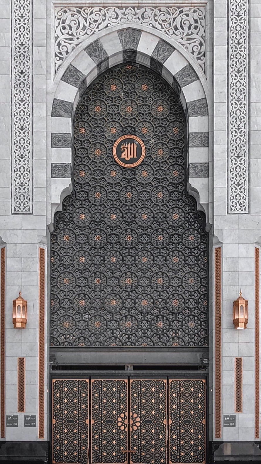 Ornate Islamic Archway with Intricate Geometric Metalwork and Calligraphy HD phone wallpaper