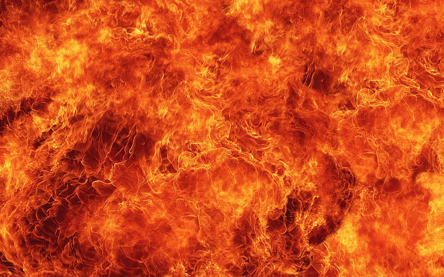 Intense Close-Up of Roaring Orange Flames and Blazing Fire Texture HD wallpaper