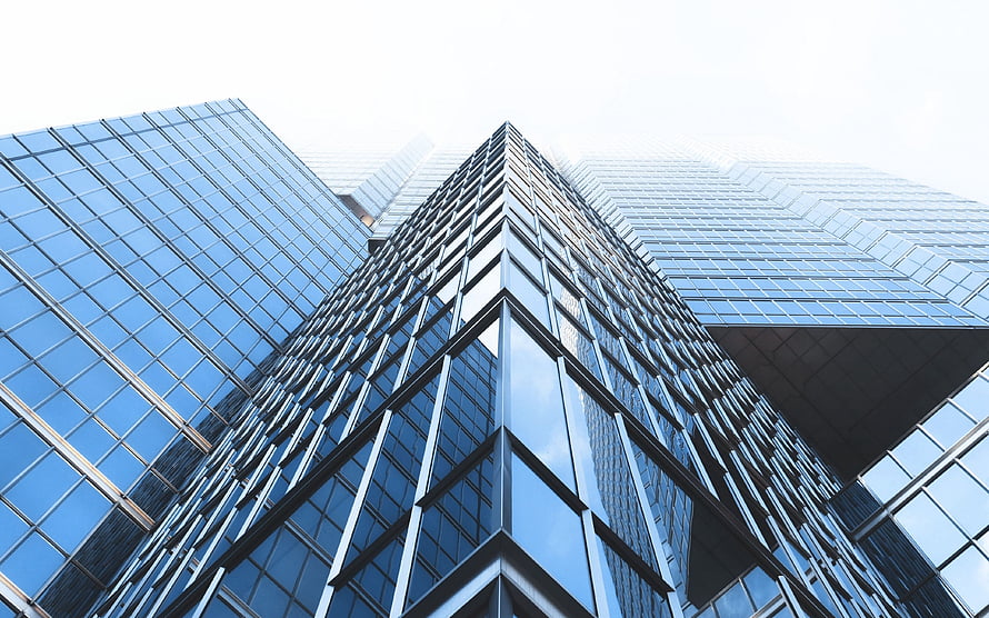 Modern Glass Skyscraper Architecture Looking Up at Corporate Office Tower Facade HD wallpaper