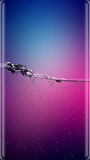 Vibrant Water Splash on Gradient Purple and Blue AMOLED Curved Display HD phone wallpaper