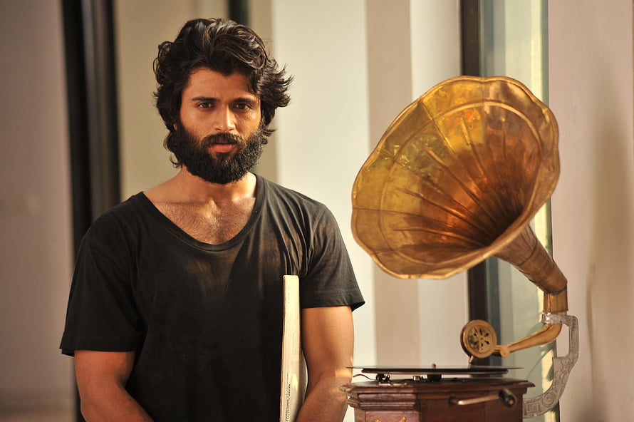Arjun Reddy Film Still Featuring Bearded Man and Vintage Gramophone HD wallpaper