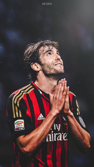 Kaka in AC Milan Striped Jersey with Hands Together in a Moment of Gratitude HD phone wallpaper